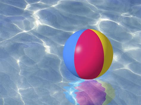 Beach ball in swimming pool Free Photo Download | FreeImages