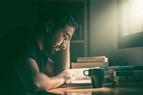 Photo of Man Reading a Book · Free Stock Photo