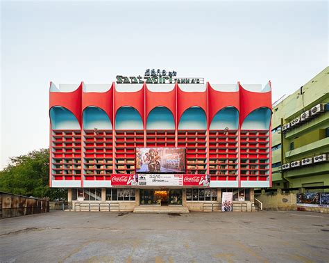 vibrant façades animate movie theater architecture in south india