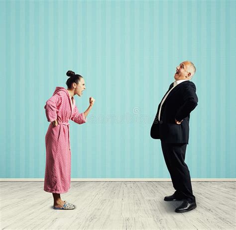 Emotional Woman and Laughing Man Stock Photo - Image of home, reprimand ...