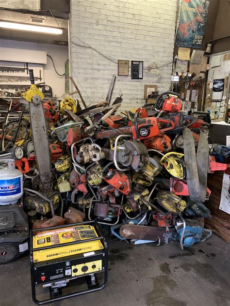 Lawn Mower repair place near me has a pile of discarded chainsaws. : r ...