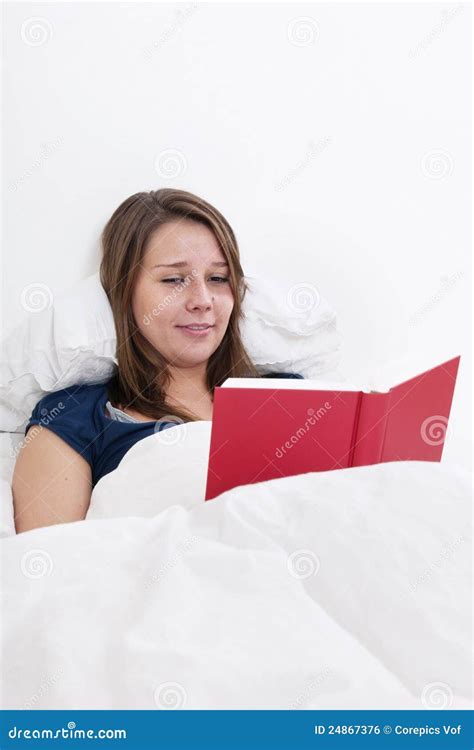 Woman reading in bed stock photo. Image of funny, cover - 24867376