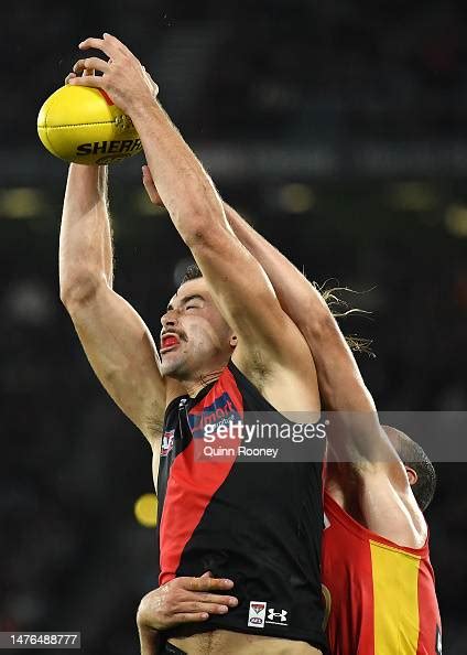 Sam Draper of the Bombers marks during the round two AFL match... News ...