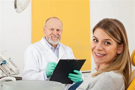 Smiling Patient at the Dentist Office Stock Image - Image of diagnosis, dental: 109970775