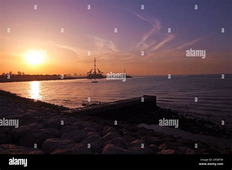 Kuwait city sunset Stock Photo - Alamy