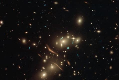 NASA Hubble Telescope Captures Stunning Image Of A Sparkling Galaxy Cluster! - Science