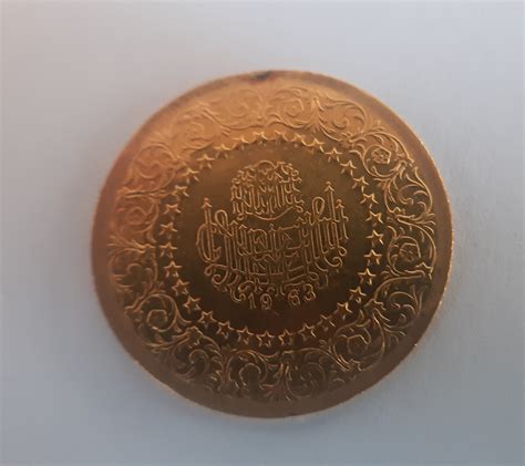 Looking for help with a gold coin identification : coins