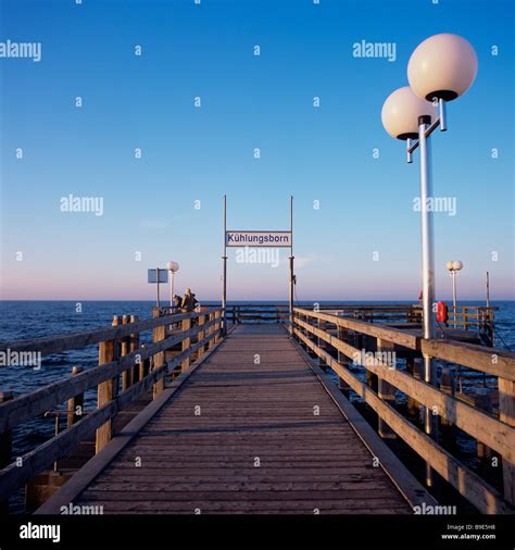 A pier in Kuehlungsborn at sunset, Germany Stock Photo - Alamy