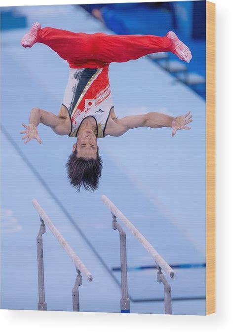 Tokyo 2020 Kazuma Kaya Olympic Parallel Bars Wood Print by Photo File - Pixels