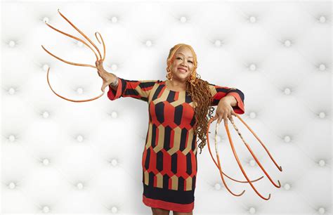 This woman has the longest nails in the world, and she’s been growing them for over 23 years