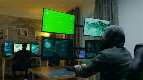 Hackers And A Green Screen - Stock Photos | Motion Array