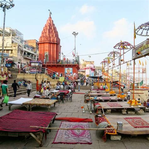 Setting up for the night ceremony along a ghat in Varanasi, India ...