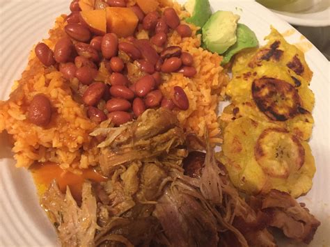 [Homemade] Puerto Rican pernil/roast pork with rice & pink beans and side of tostones/fried ...