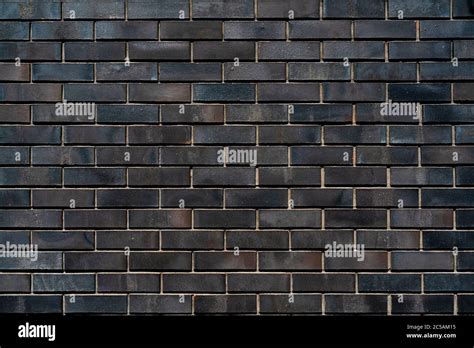 Black brick wall of building. Brick texture. Architectural abstract ...