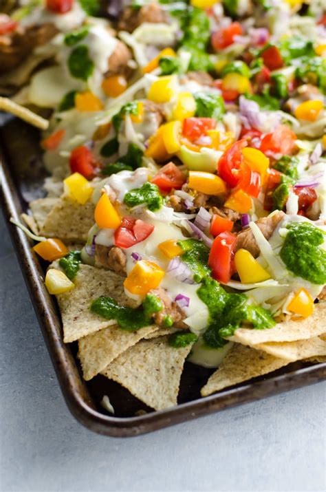 Easy Vegetarian Nachos Recipe with Creamy Cheese Sauce | Umami Girl