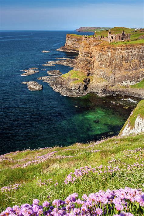 Ruins of medieval Dunluce Castle Photograph by Pierre Leclerc ...