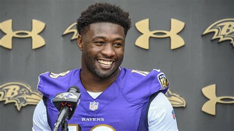 Download Smiling Baltimore Ravens Roquan Smith Wallpaper | Wallpapers.com