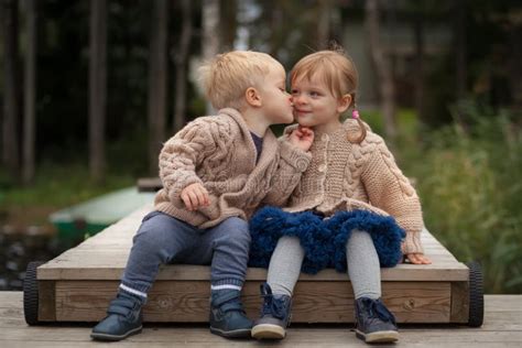 Funny twins boy and girl stock image. Image of beautiful - 162280263