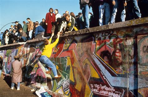 Iconic photos from the night the Berlin Wall fell 30 years ago