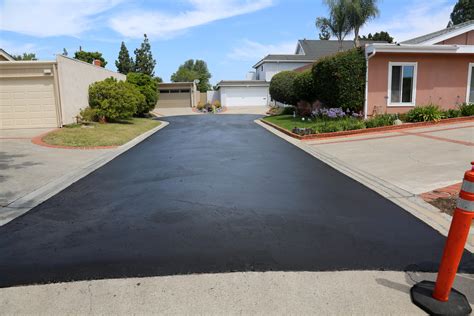 Seal Coat - Pioneer Paving & Landscaping - Asphalt - Concrete - Stripping - Seal Coat Pioneer Paving