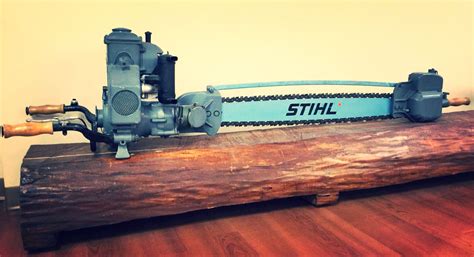 STIHL's first two-man chain saw model. | Chainsaw, Stihl, Stihl chainsaw