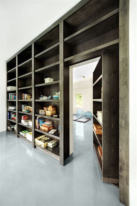 Loft bookshelf door to... | Hidden door bookcase, Hidden door, Hidden rooms