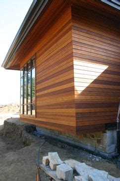 Clear vertical grain cedar siding being installed. Notice the artistic color matching.... | Wood ...