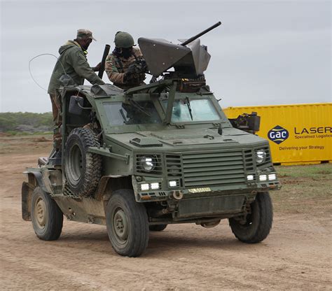 South African SF with a Hornet tactical vehicle with a long range 60mm mortar and a .50 caliber ...