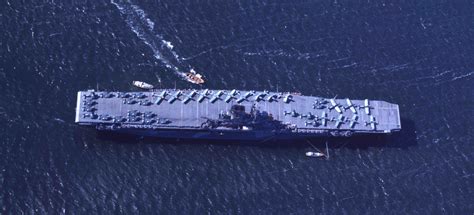 Color photo of USS Wasp in Casco Bay, Maine, on March 25th, 1942. Over three dozen SB2U ...