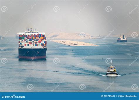 Huge Cargo Ships Navigate through Suez Canal. Shipping Canal in Egypt Editorial Photography ...