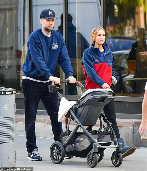 Jennifer Lawrence and husband Cooke Maroney push baby Cy in stroller on ...