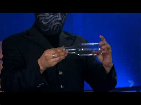 The Masked Magician Secrets Revealed - the magic bottle top - YouTube