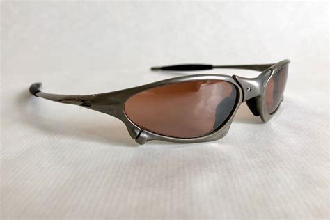 Oakley X Metal Penny Titanium Vintage Sunglasses New Old Stock including Softpouch