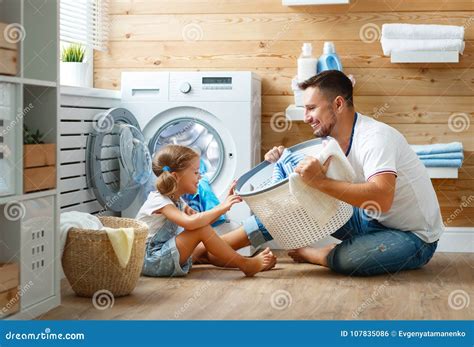 Happy Family Man Father Householder and Child in Laundry with Stock ...