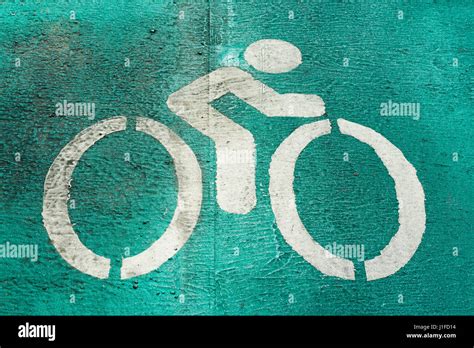 Bicycle road sign on the road, Closeup Stock Photo - Alamy