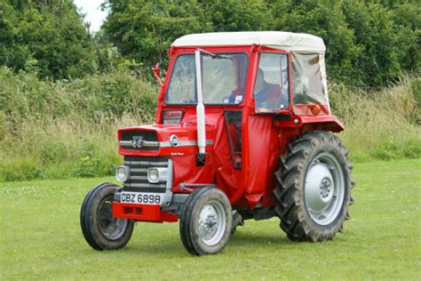 Red Massey 135 Tractor With Cab