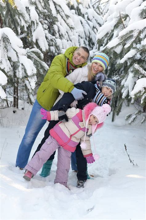 Big Happy Family Having Fun in Winter Park Covered with Snow Stock ...