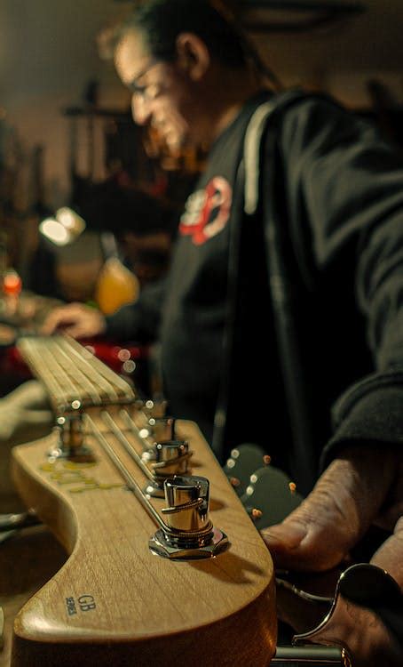 Photograph of an Electric Guitar with Tuning Pegs · Free Stock Photo