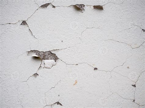 white wall with cracks on paint 8905764 Stock Photo at Vecteezy