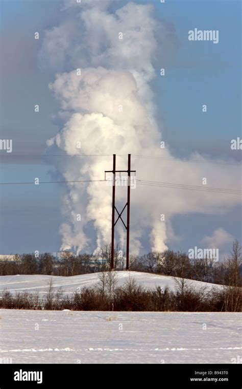 Power Lines and Pulp Mill Pollution Stock Photo - Alamy