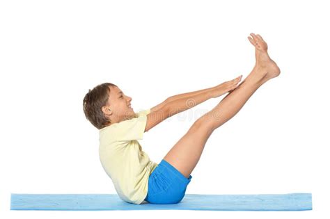 Young boy doing exercises stock image. Image of exercises - 119695393