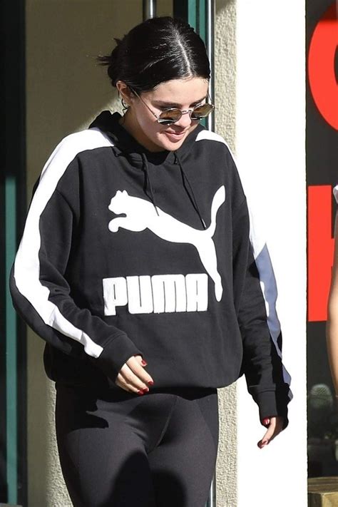 Selena Gomez in Puma Classics Logo T7 Hoodie 12/27/2018 • CelebMafia