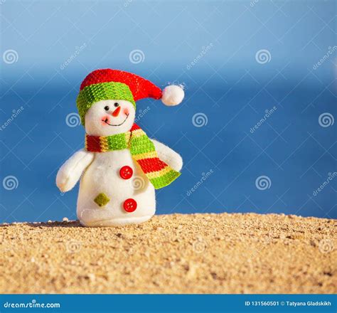 Snowman on sand stock image. Image of snowman, climate - 131560501