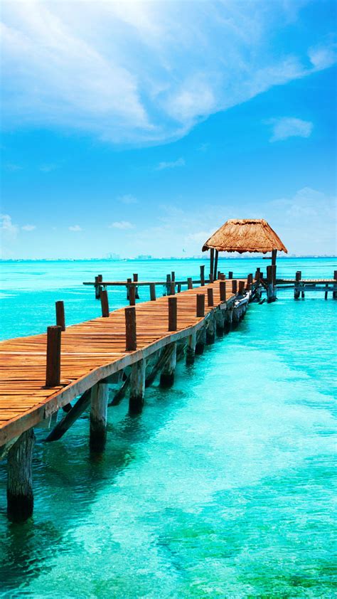 Download 4k Iphone Wooden Beach Pier Wallpaper | Wallpapers.com