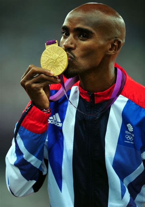 Mo Farah with his gold medal after winning the Men's 5,000 metres ...