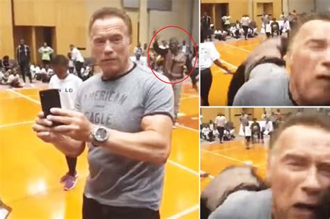 Arnold Schwarzenegger drop-kicked while greeting fans