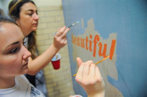 Volunteers paint 100 murals at Kensington school for MLK Day - WHYY