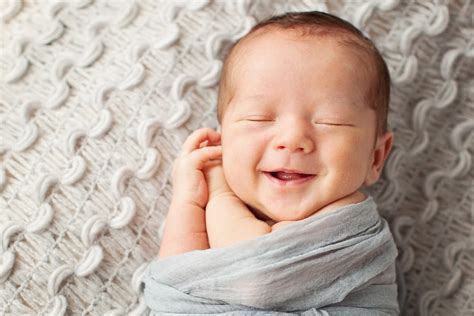 Smiling, Sleeping Newborn - Miette Photography