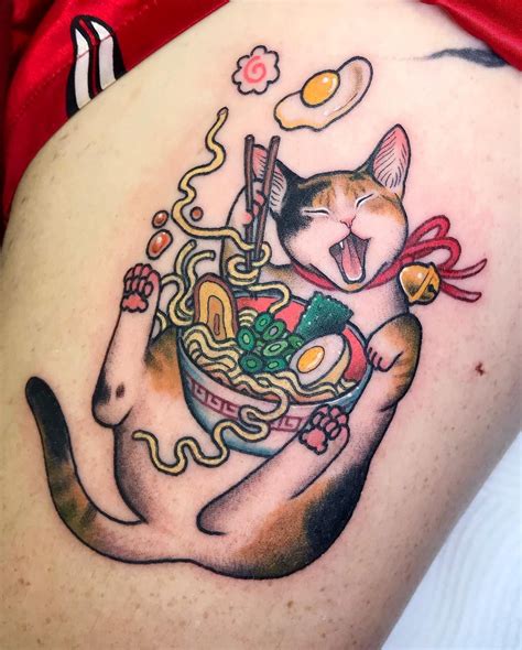 a woman with a cat tattoo on her thigh holding a bowl of noodles and ...