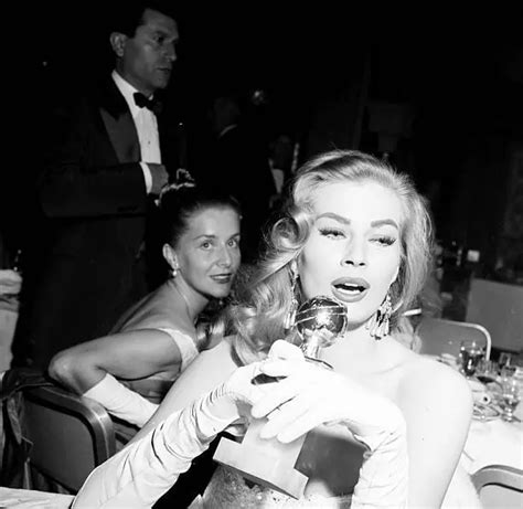 ANITA EKBERG POSES with her Golden Globe award during the Foreig - 1956 ...